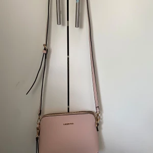 Leisure väska - En rosa väska från Leisure, har använt ca två gånger