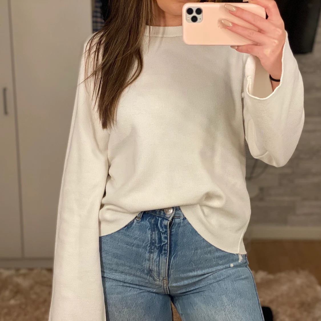 Tröja med utsvänga armar strl M