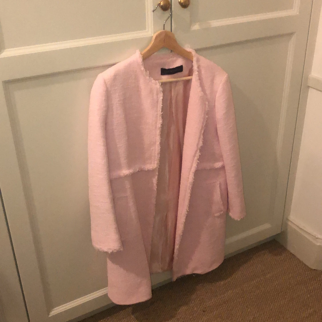 Rosa stickad (tweed) kappa från zara