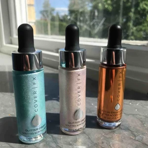 Coverfx - Äkta oöppnade Cover fx custom enhancer drops & glitter drops. Från vänster: Lunar, aurora & candlelight. Används på ansiktet eller blanda med body lotion och få en fin glitterig / bronze glow på kroppen. Köpte hos Åhléns för 445:-. En för 250.