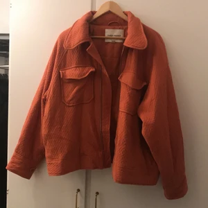 Jacka Carin Wester  - Använd sparsamt! Orange jacka i storlek L 