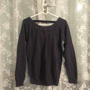 Soft cotton sweater with open back. Size M but I’d say rather S.