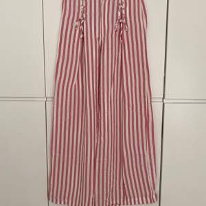Zara TRF collection high waste, wide legs pink & white striped pants. Lacing details on the front. Size S. Excellent condition, worn only once.