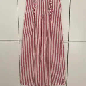 Zara TRF collection high waste, wide legs pink & white striped pants. Lacing details on the front. Size S. Excellent condition, worn only once.