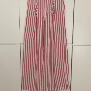 Zara palazzo pants - Zara TRF collection high waste, wide legs pink & white striped pants. Lacing details on the front. Size S. Excellent condition, worn only once.