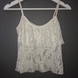 Spetstopp - En vit spetstop som är använd ett fåtal gånger, frakt tillkommer