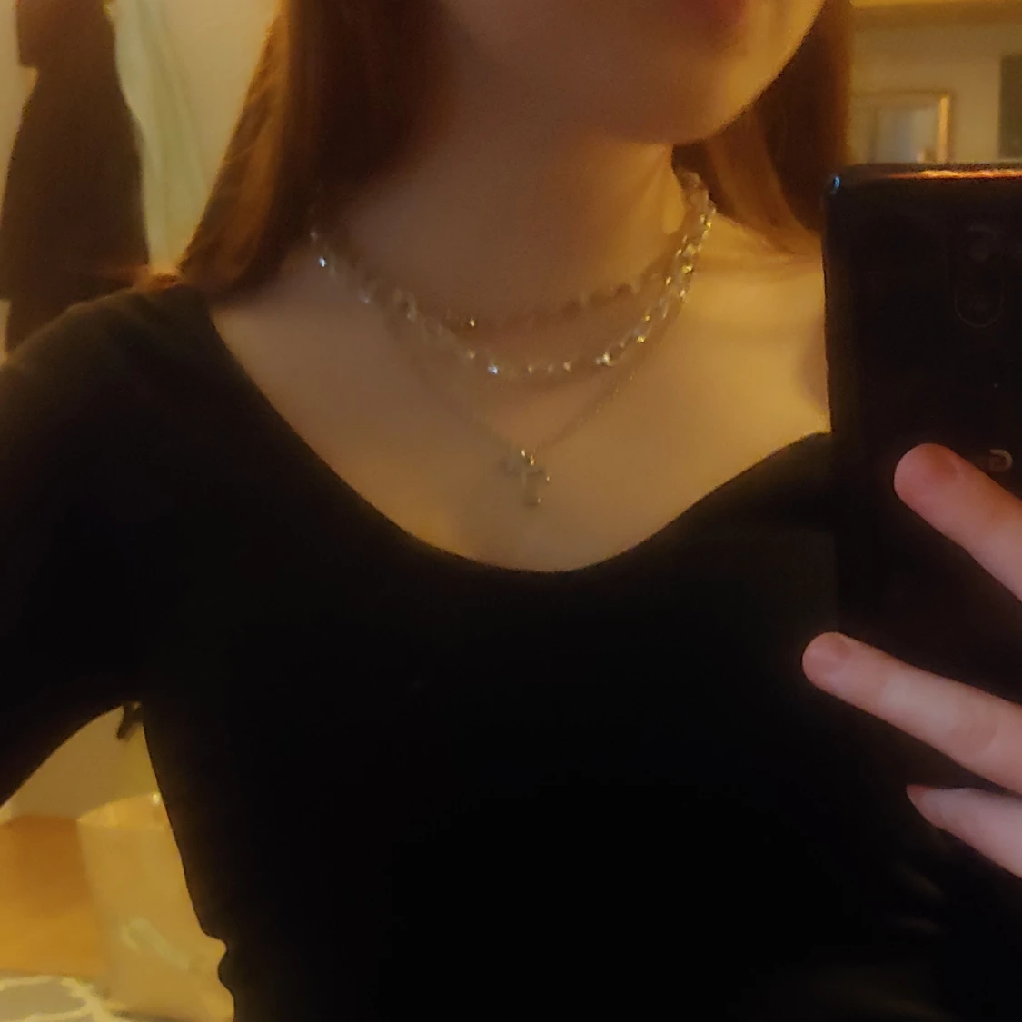 Svart urringad tröja storlek xs