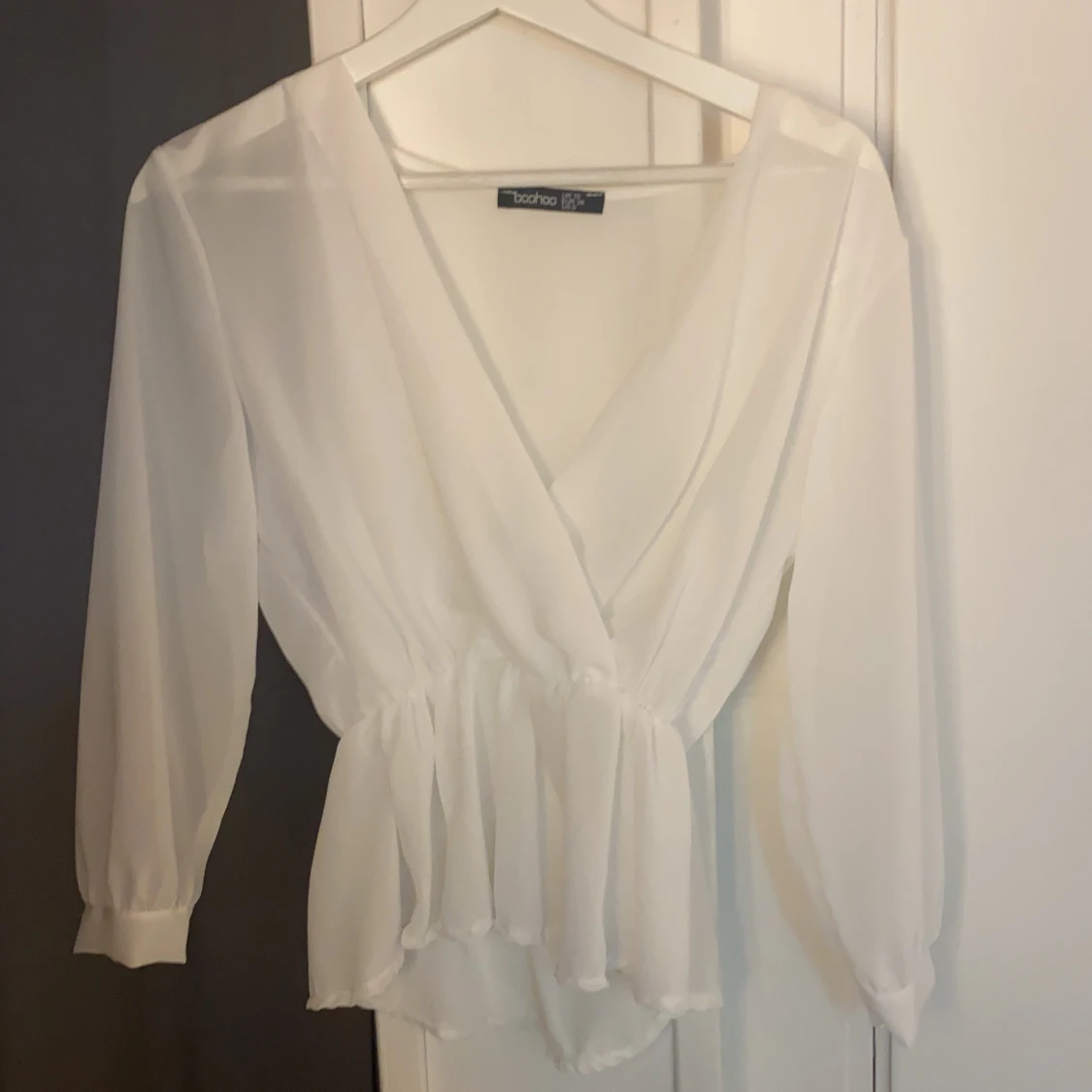 vit korsad top, storlek 38