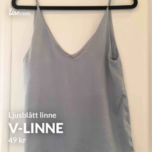  - Blått v ringat linne. Passar som en XS