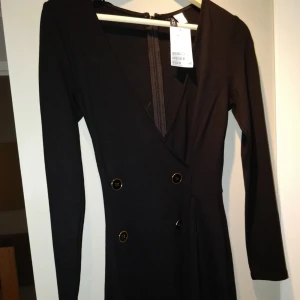  - Helt ny jumpsuit med lappar kvar .