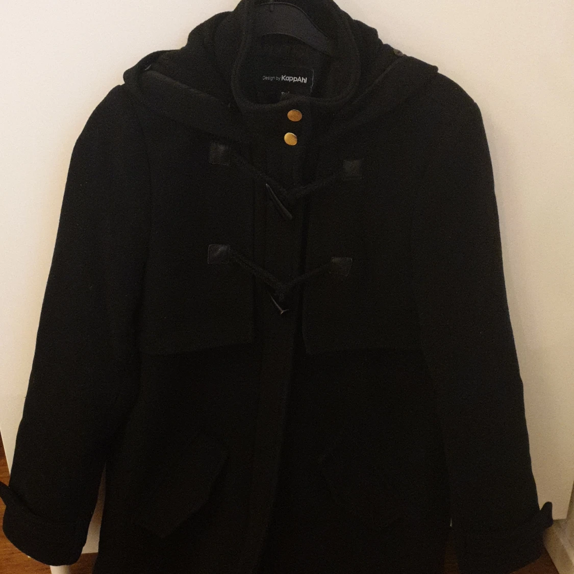 Svart kappa storlek S - 90