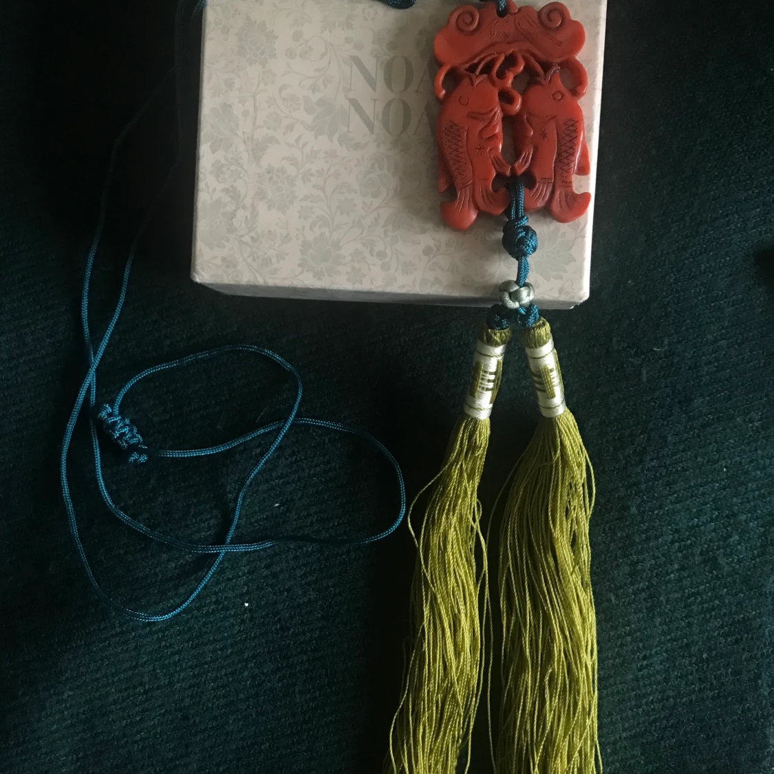 Tassle/halsband 