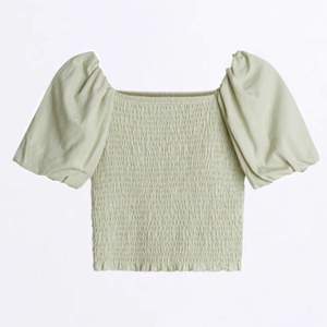 Pastell grön Nelma puff sleve top från Gina tricot, nästan oanvänd, storlek xs