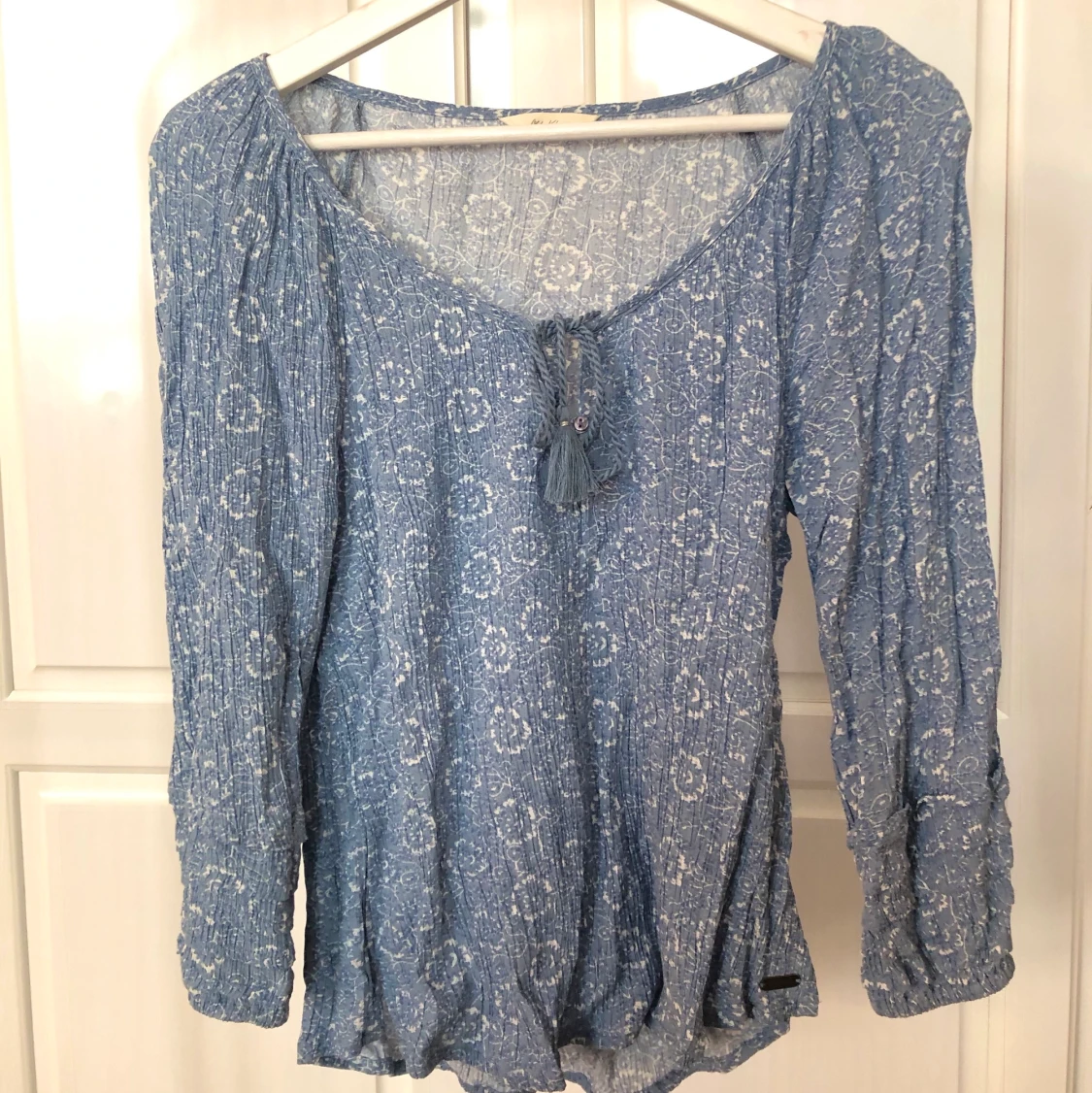 Ljusblå blus strl. S