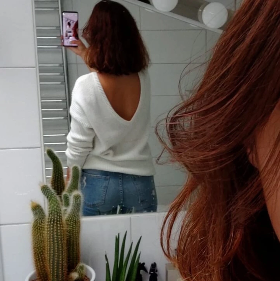 Stickad tröja med öppen rygg 