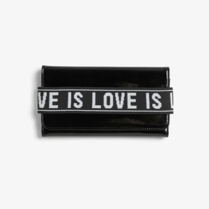  - snygg och ball plånbok från monki. på den står det love is love. riktigt schysst material och förvaring. 