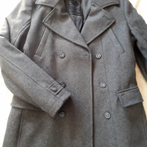  - Ullrock 3/4lång grå obetydligt använd 