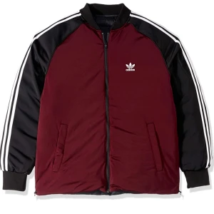 Adidas revasiable puffer jacket  - Super fin Adidas jacka. Kan användas på 2 sätt som på bilden. Den är väldigt svår & få tag på & sällsynt!! Använd vid 2 tillfällen, så den är i nytt skick!!