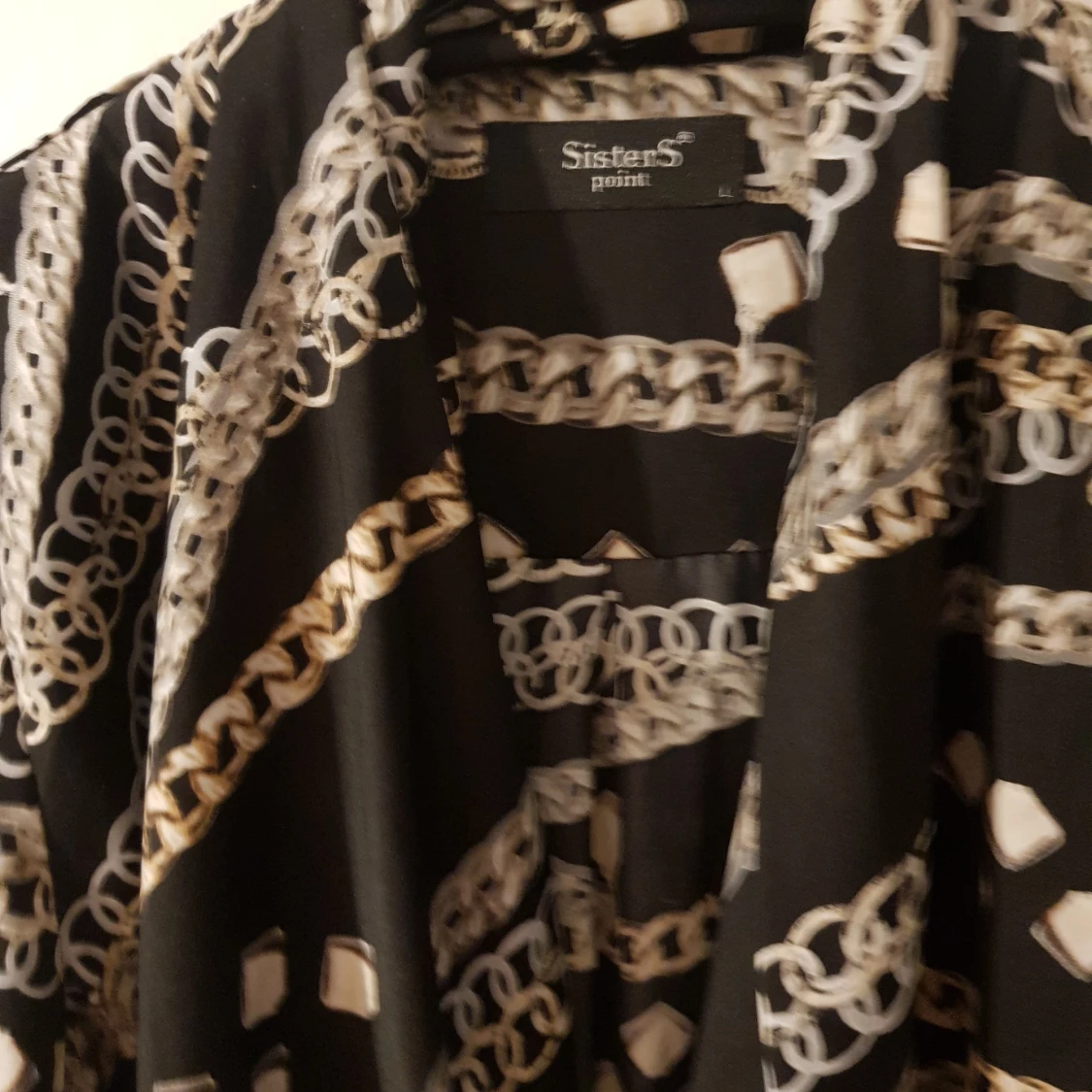 Kedjemönstrad omlottopp stl L - 90