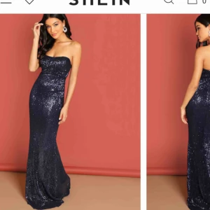  - Snygg marinblå klänning med paljetter. 