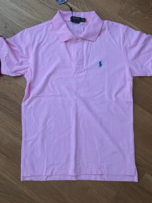 Rosa pikétröja från Polo Ralph Lauren - Har aldrig använt den pris kan sänkas vid snabb köp