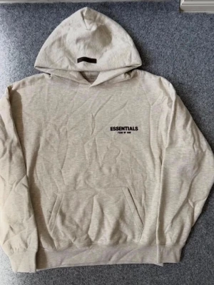 Essentials light oatmeal gray hoodie - Never used, in amazing condition. Ask DM for more questions and follow insta to join our giveaways!