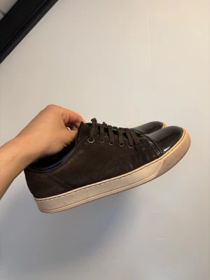 Lanvin captoes bruna - Mörkbruna lanvin captoes i bra skick! Skorna är storlek 6UK