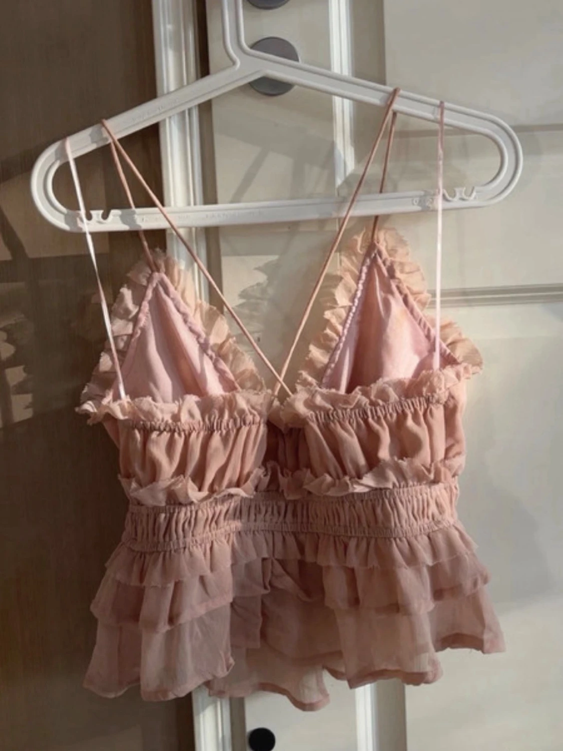 Ljusrosa volangig linnetopp - 1