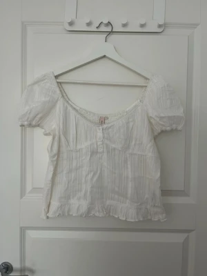 Babydoll topp - helt ny aldrig använd topp från nelly!