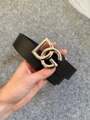 Dolce & Gabbana black and gold belt - 120cm. As new