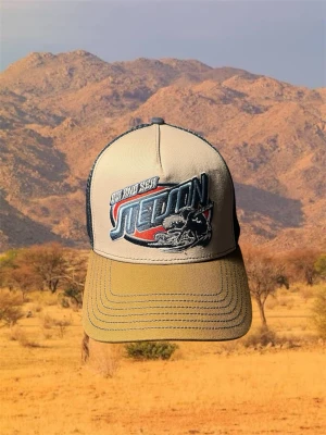 Stetson keps - En blå, vit och ljusbrun keps från Stetson med en snygg bild på framsidan av kepsen. Kepsen är i helt nytt skick och kostar runt 500kr ny. 