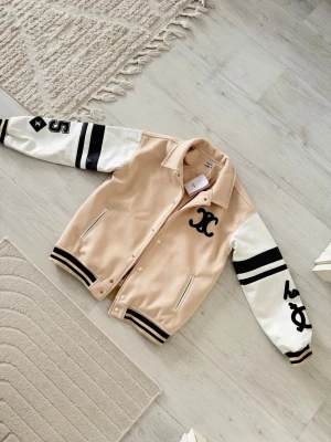 Celinie beige varsity bomber jacket - Size M, true to size. Just like new, very comfortable and high quality.