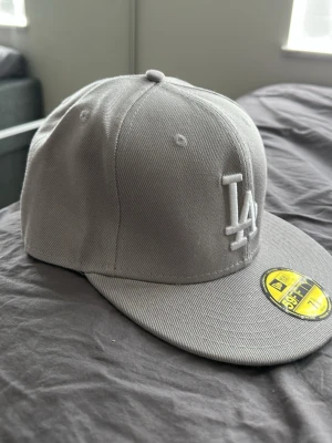grey cap - perfect for summer, price can be discussed 
