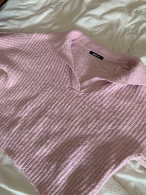 Rosa stickad tröja - från gina i storlek XS 