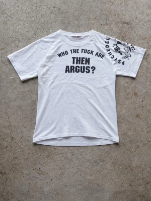 Upcycled raglan t-shirt - Upcycled raglan tee we’ve sewn, combining two vintage graphic tees. Boxy fit and in great condition, 100% cotton.