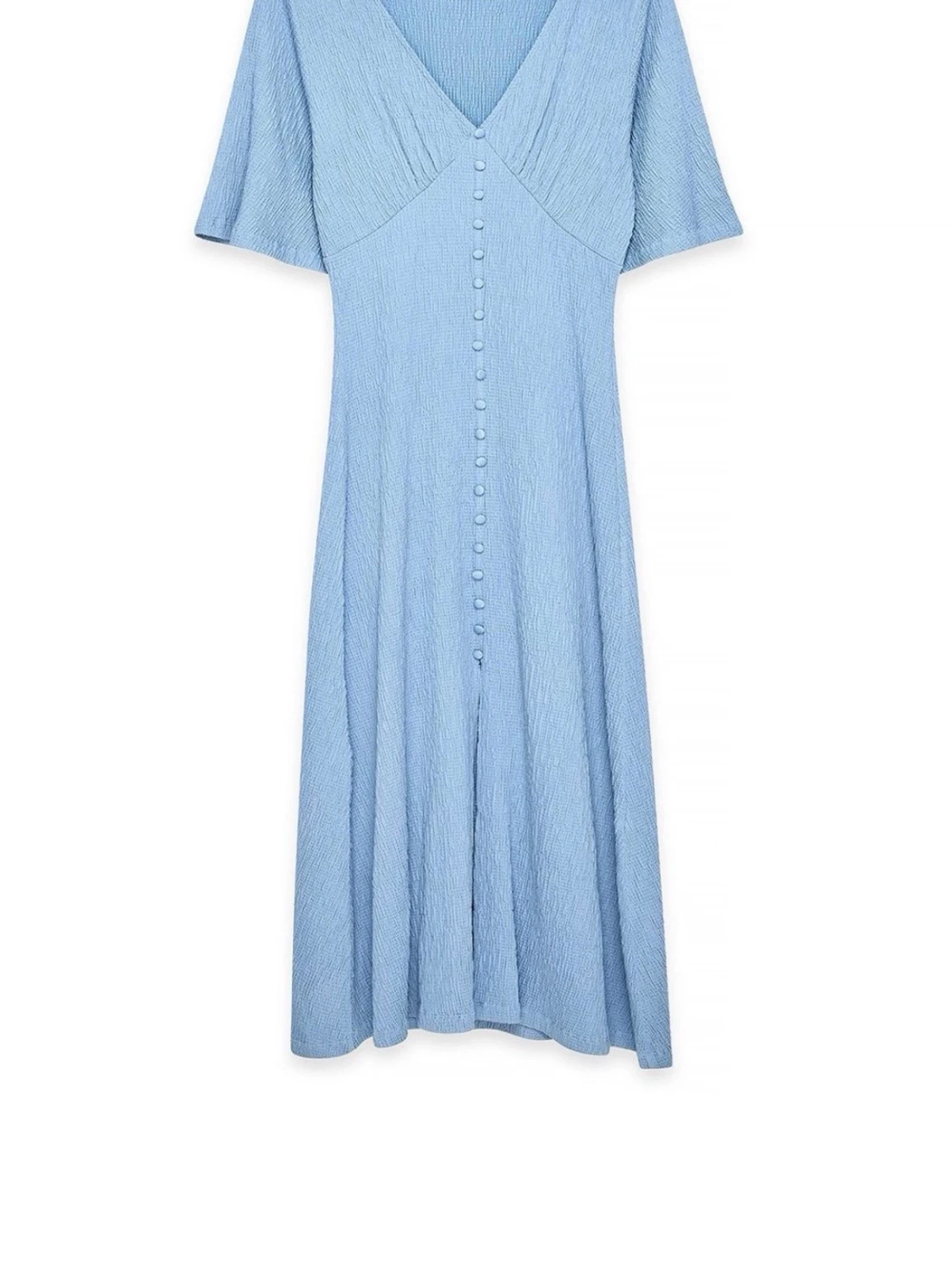 Ljusblå klänning med knappar