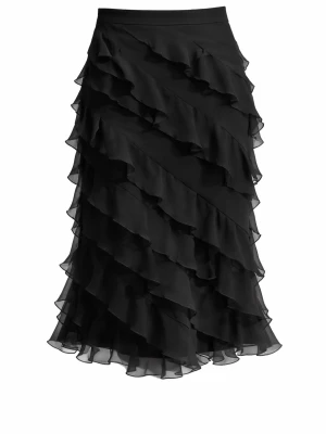 Svart volangkjol från SHEIN - Snygg svart kjol från SHEIN med diagonala volangdetaljer och lätt transparent material. Kjolen har en elegant design och är perfekt för dig som vill sticka ut med en trendig look.