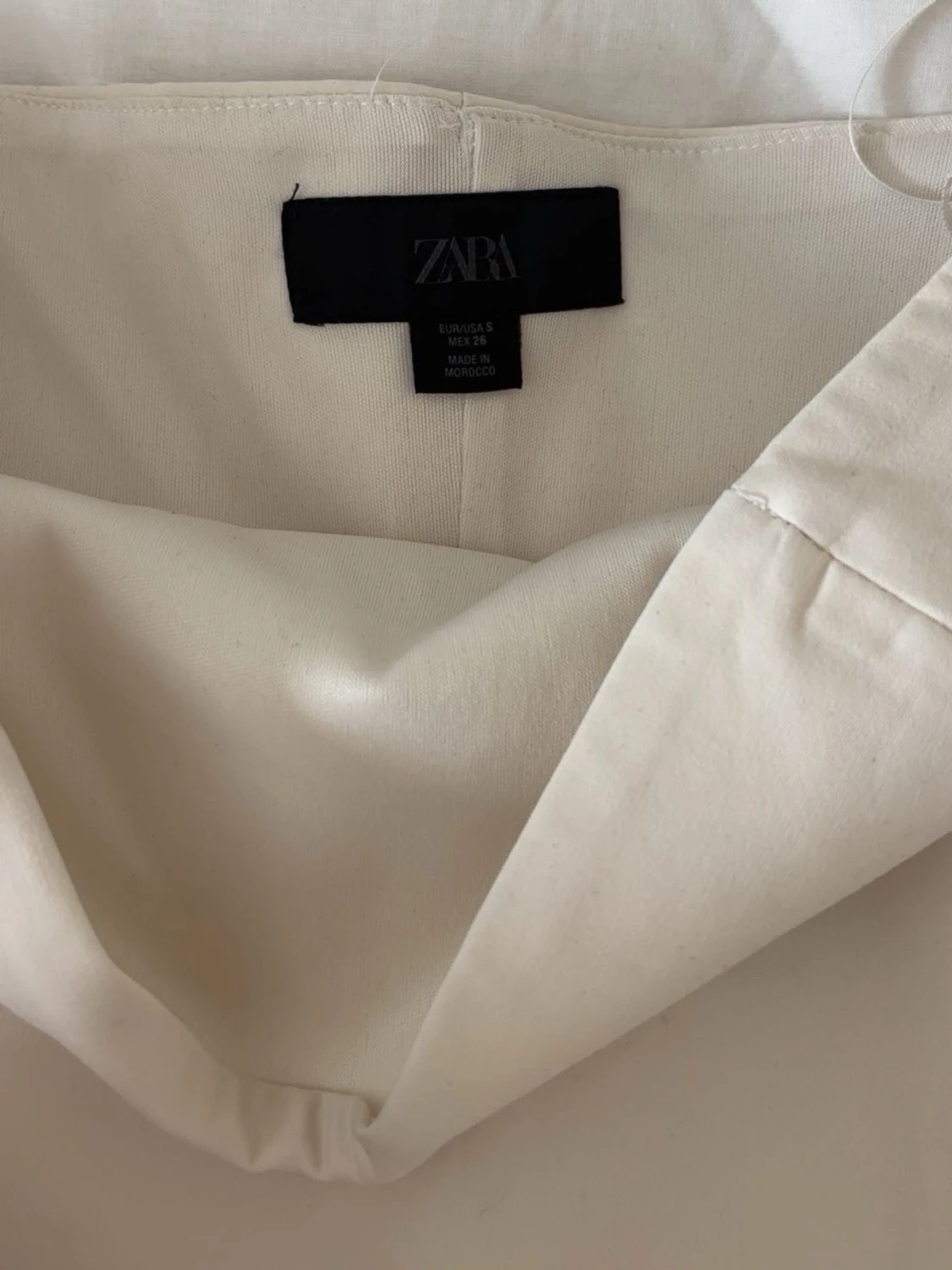 Beige axelbandslös tubtopp med rosett - 2