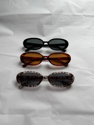 Solglasögon 3 Pack - Helt nya aldrig använts. Alla 3 st medföljer