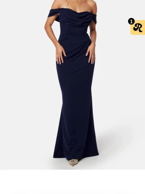 Bubbleroom balklänning - Marinblå balklänning från bubbleroom, jag har inte använt den då storleken var för stor mig. Köpte den för 600 kr när de va rea men orginalpriset är 1200kr.