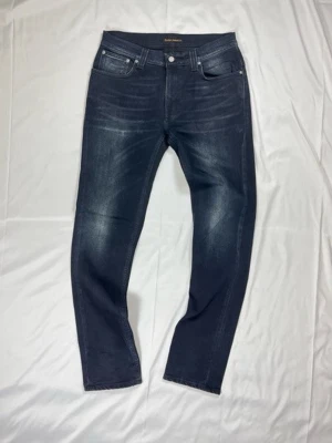 Nudie Jeans Thin Finn – Black & Grey – Strl W33/L34 - Färg: Mörkblå/svart-grå wash | Modell: Thin Finn slim fit | Storlek: W33/L34 | Skick: 10/10 | Stretch | Hör av dig vid frågor!