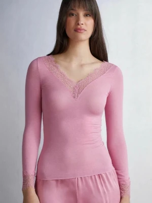 Rosa intimissmi tröja  - Söt rosa långärmad topp med v-ringning och spetsdetaljer vid halsringning och ärmslut. Tunn och stretchig modell som sitter tight och är perfekt för en avslappnad men ändå stilren look.