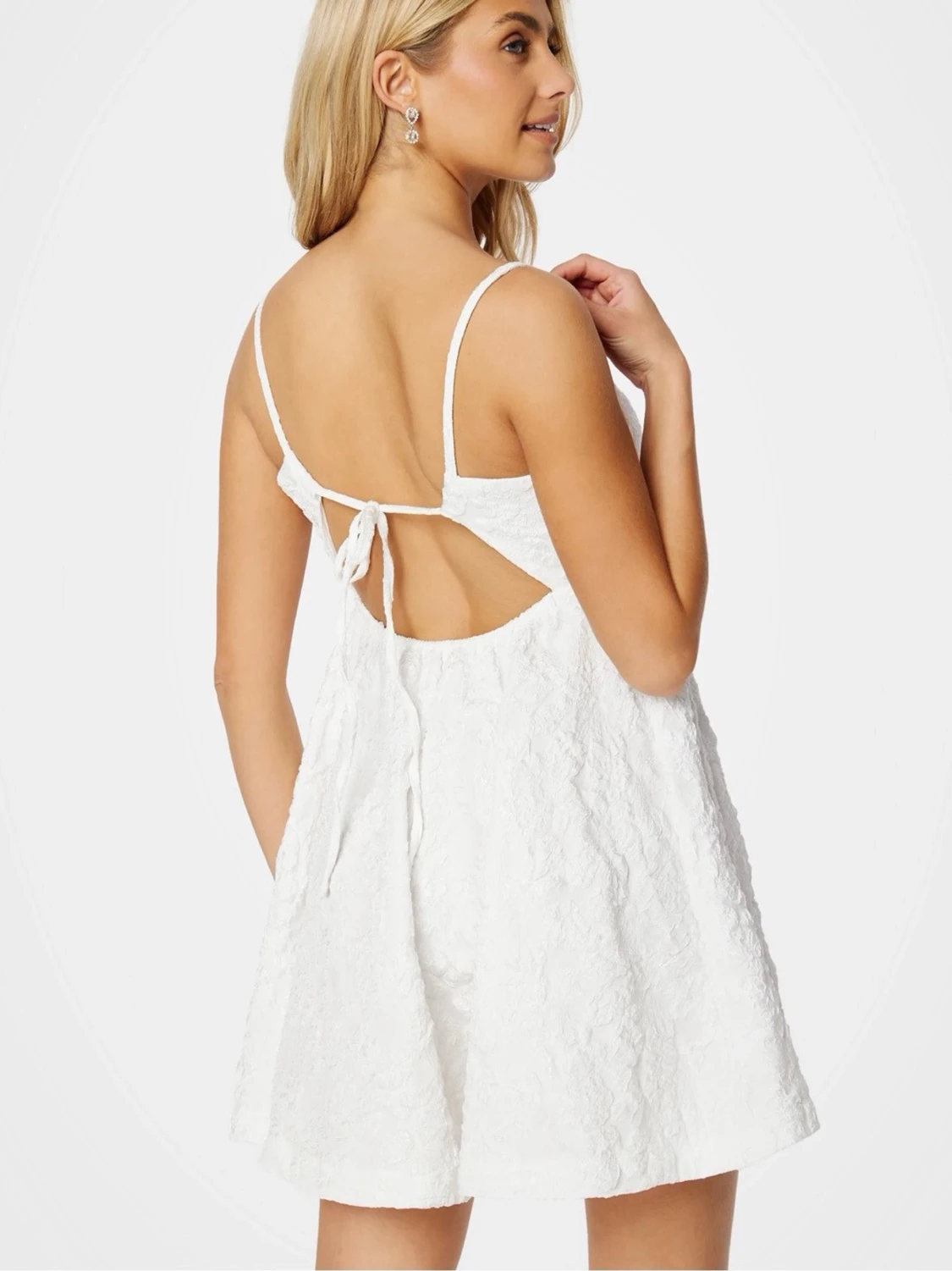 Studentlänning med öppen rygg