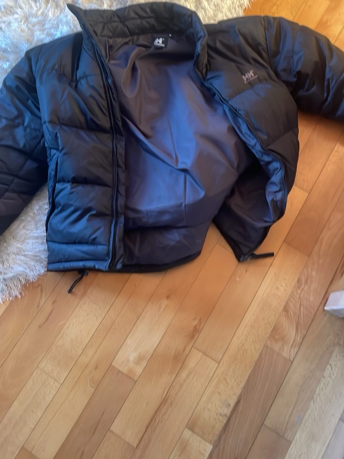 Svart pufferjacka från Helly Hansen - 1