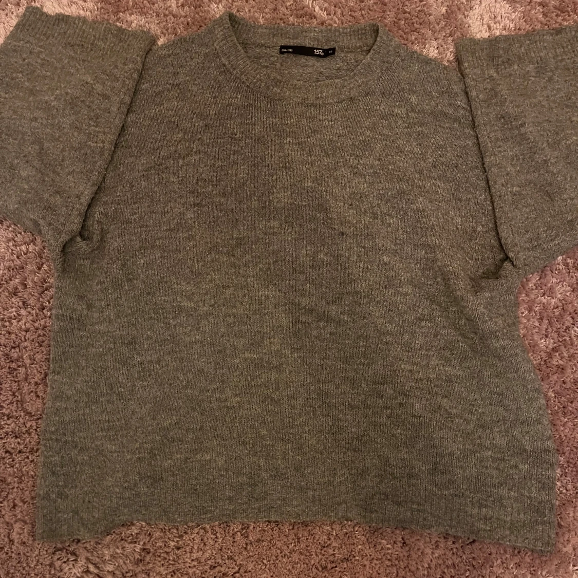 Grå stickad tröja från 157