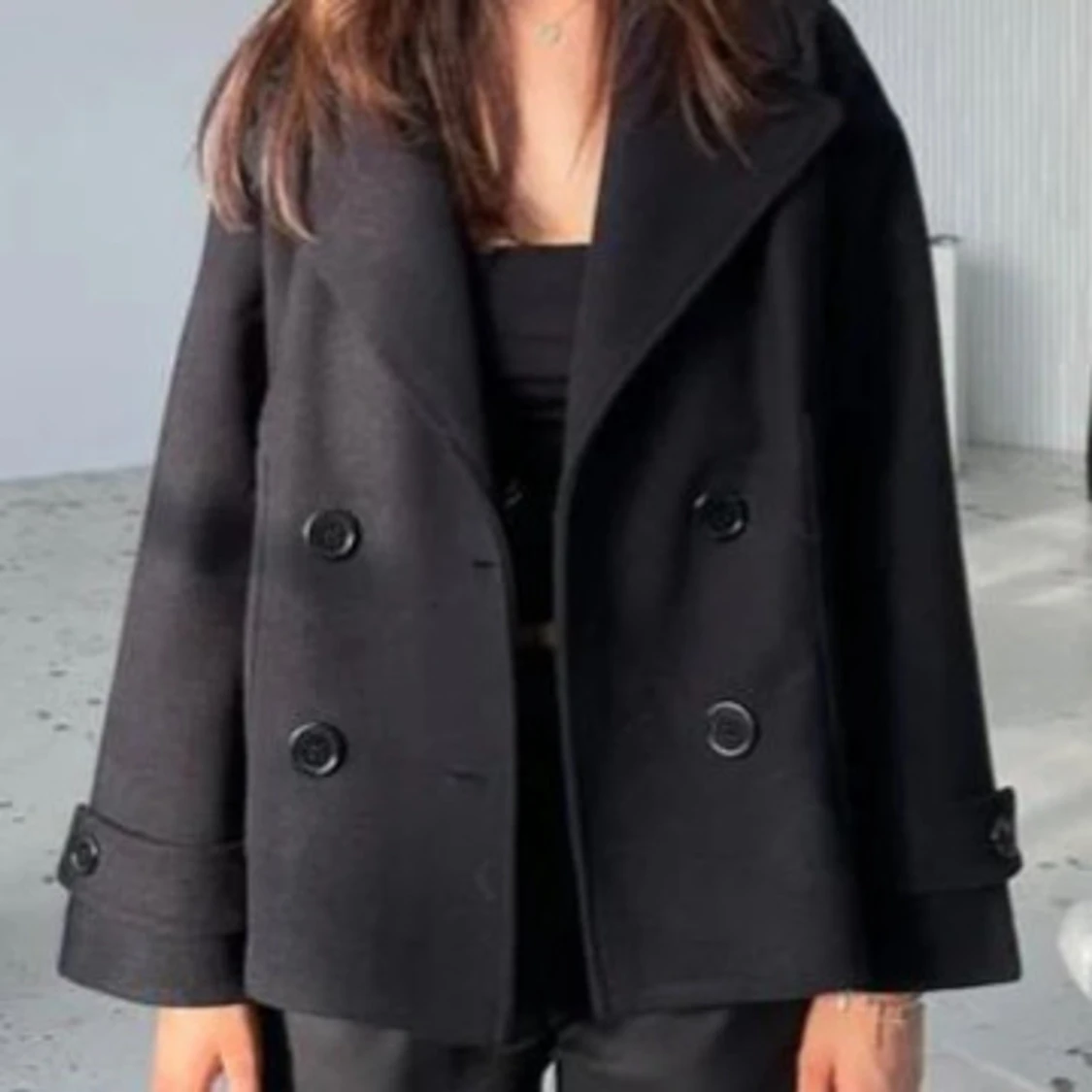 Svart kappa ifrån design by si