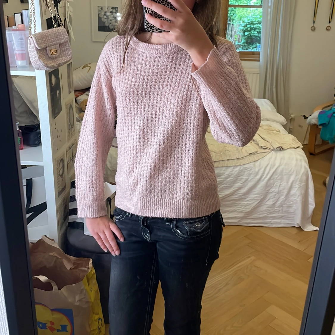 Ljusrosa stickad tröja