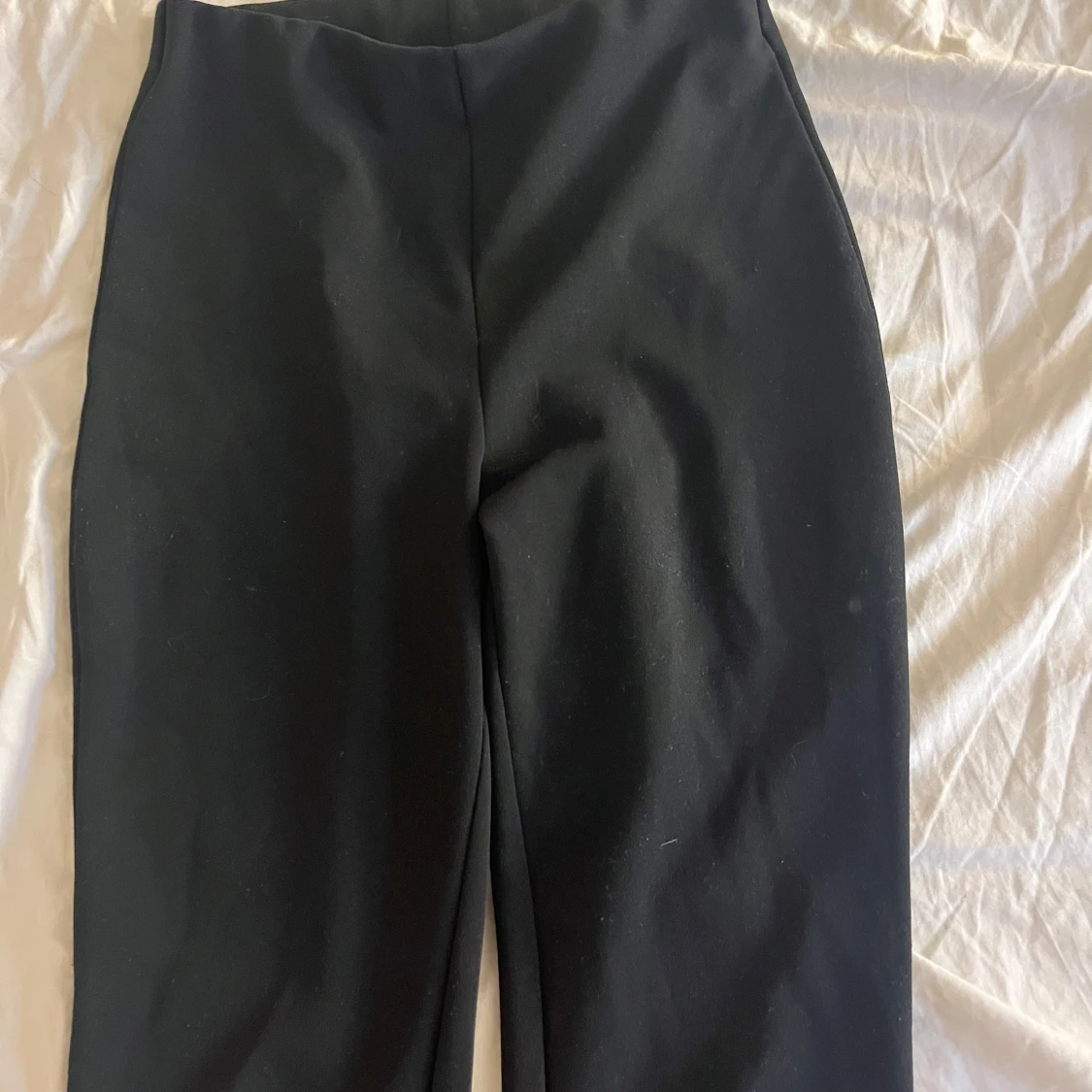 Svarta bootcut byxor med låg midja - 1