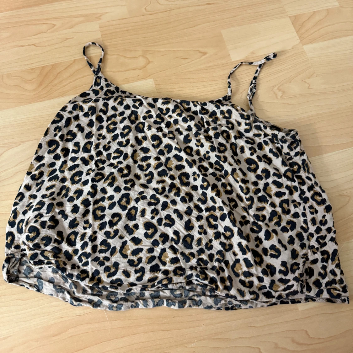 Leopardmönstrad linnetopp