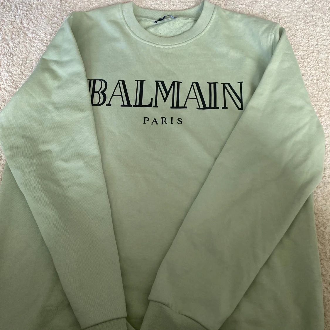 Ljusgrön sweatshirt från Balmain